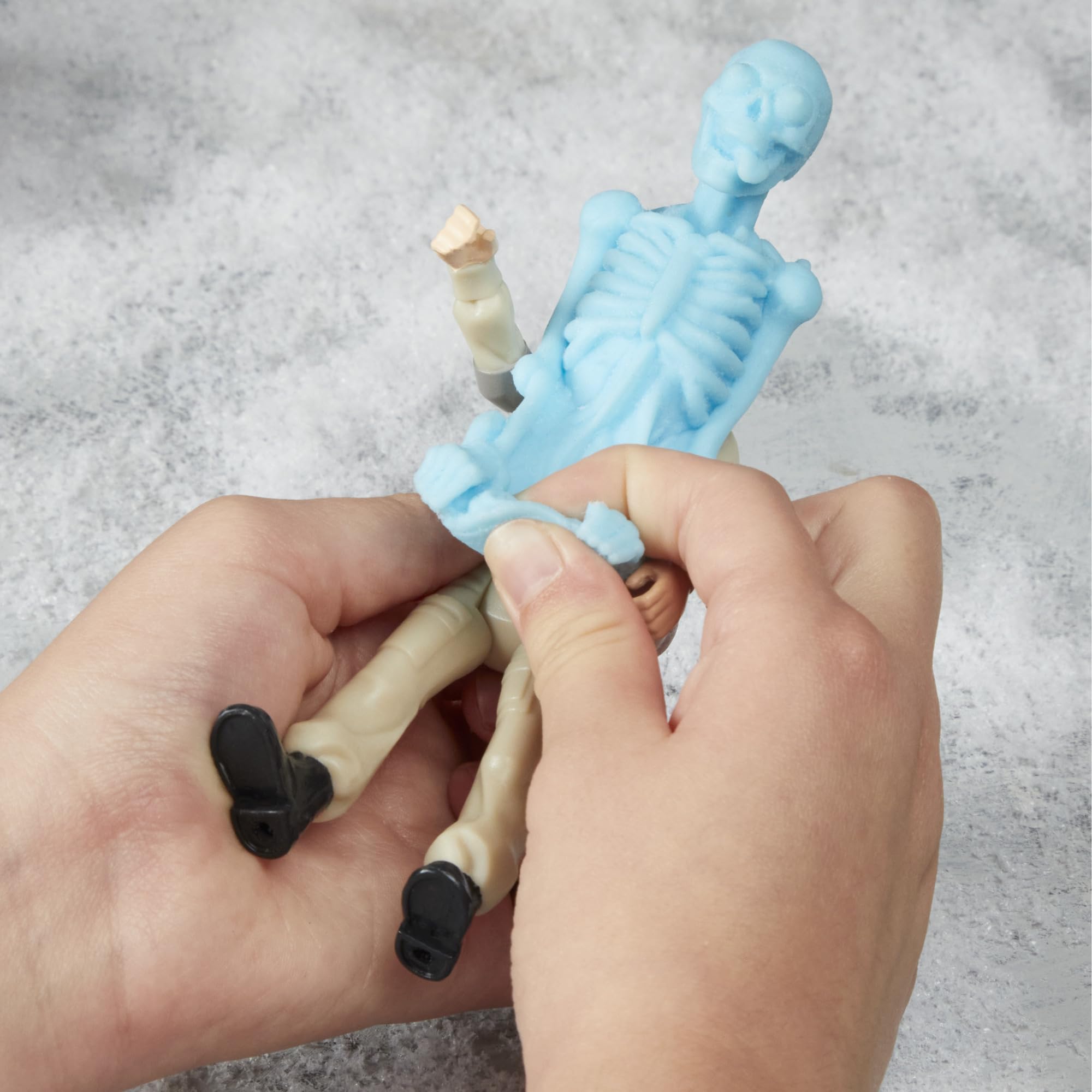 Ghostbusters Fright Features Phoebe Spengler Action Figure with Stretchy Bonesy Ghost and Proton Pack