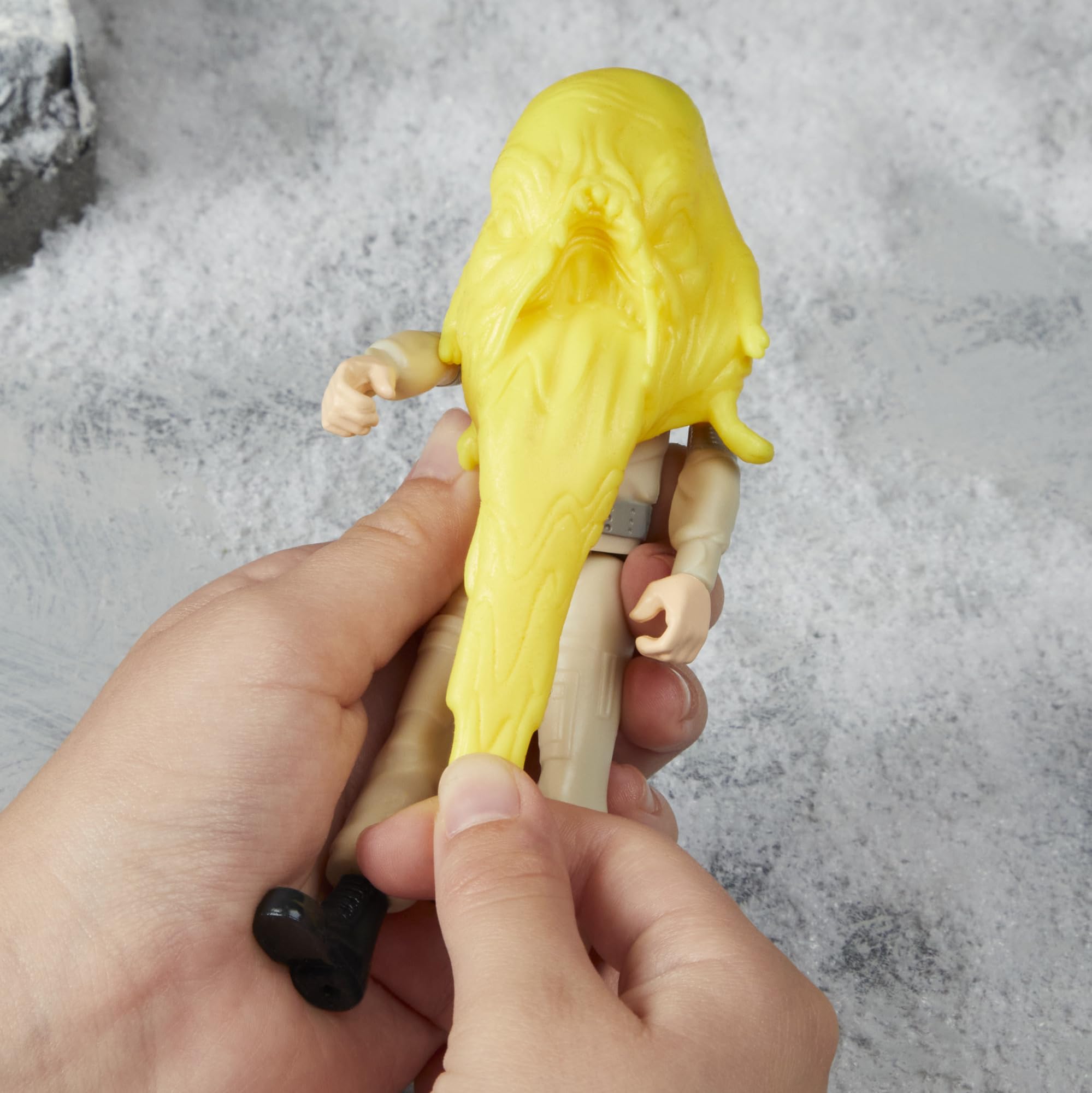 Ghostbusters Gary Grooberson Action Figure with Stretchy Pukey Ghost and Proton Pack Accessory