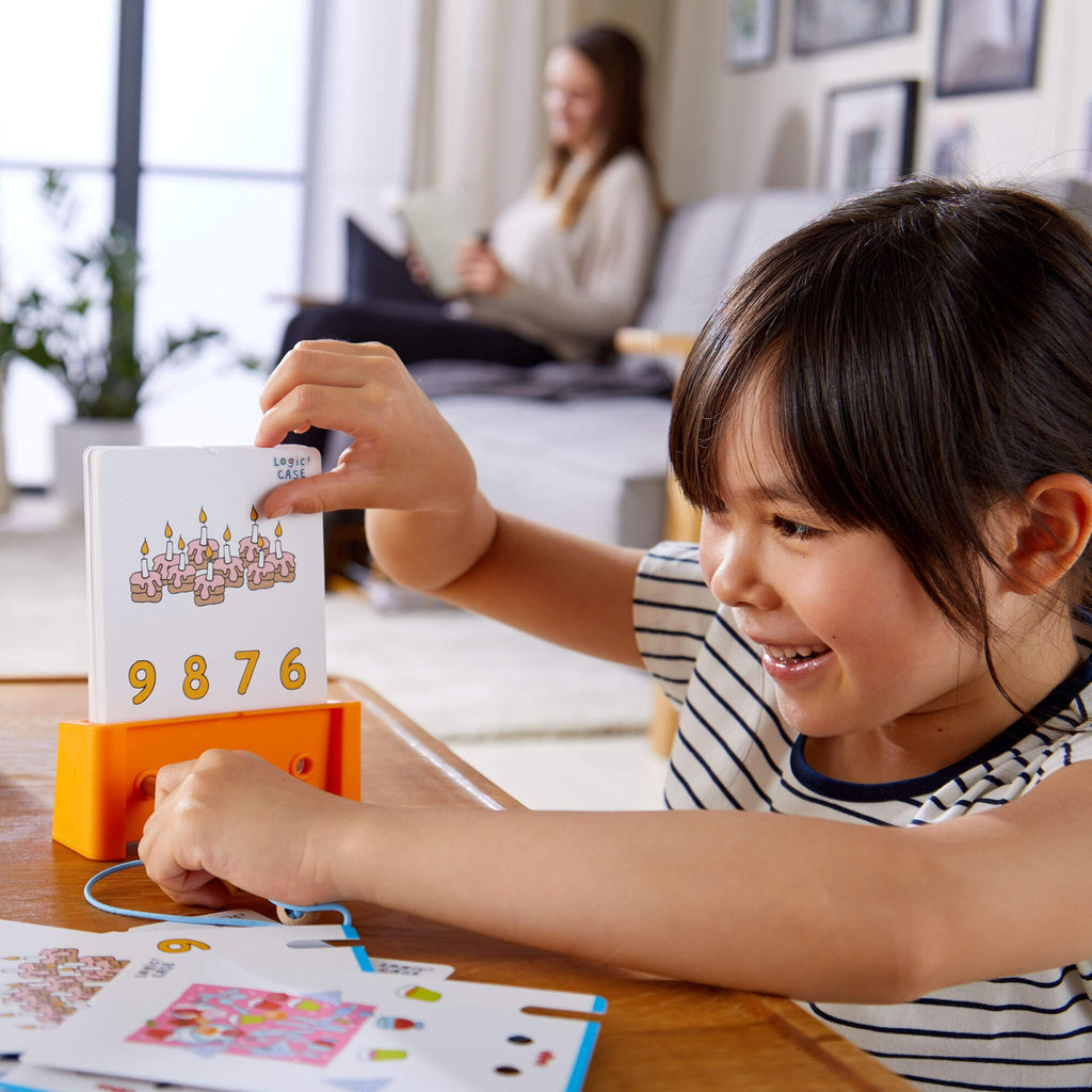 HABA Logic! CASE Starter Set 6+ – 77 Brain Teaser Puzzles for Kids, Travel Game with Self-Checking Wooden Peg