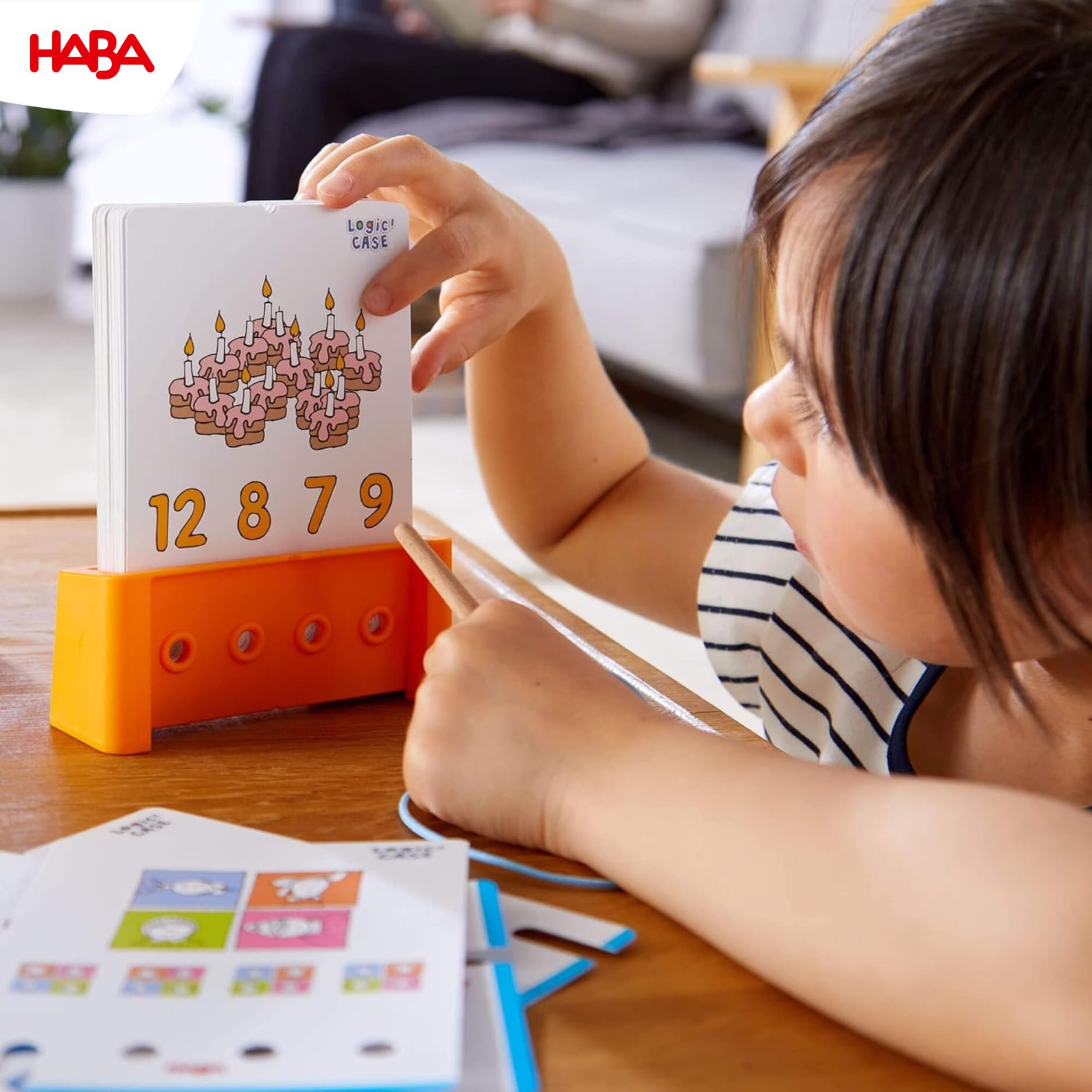 HABA Logic! CASE Starter Set – 77 Brain Teaser Puzzles for Kids Ages 4-8, Self-Checking Handheld Game for Travel & Car