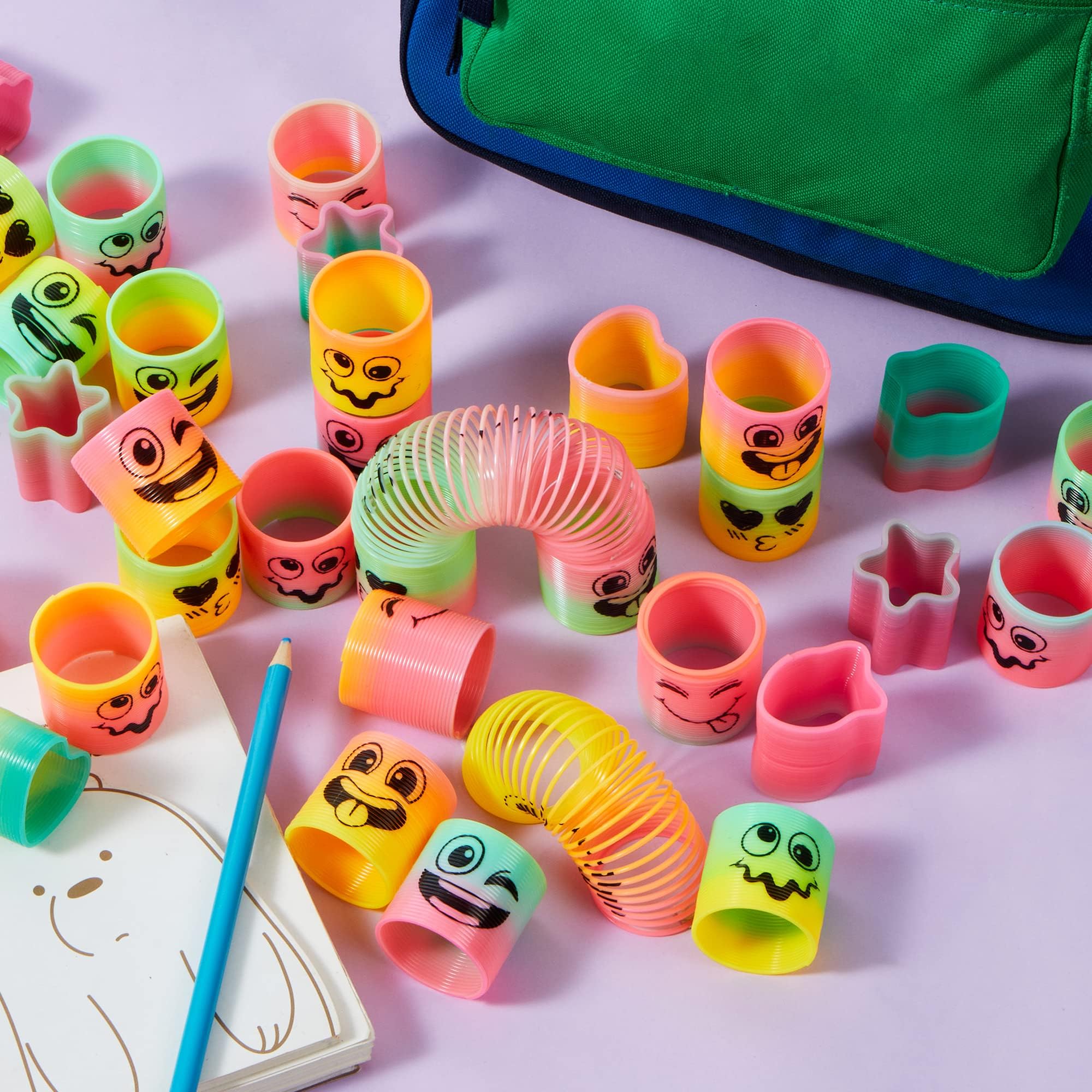 JOYIN 60 Pcs Spring Rainbow Party Favor - Mini Plastic Coil Spring Toy for Stress Relief & Goodie Bags