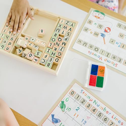 Melissa & Doug Deluxe Letters and Numbers Wooden Stamp Set – 71 Stamps, 4-Color Ink Pad, Activity Book (Ages 4-8)