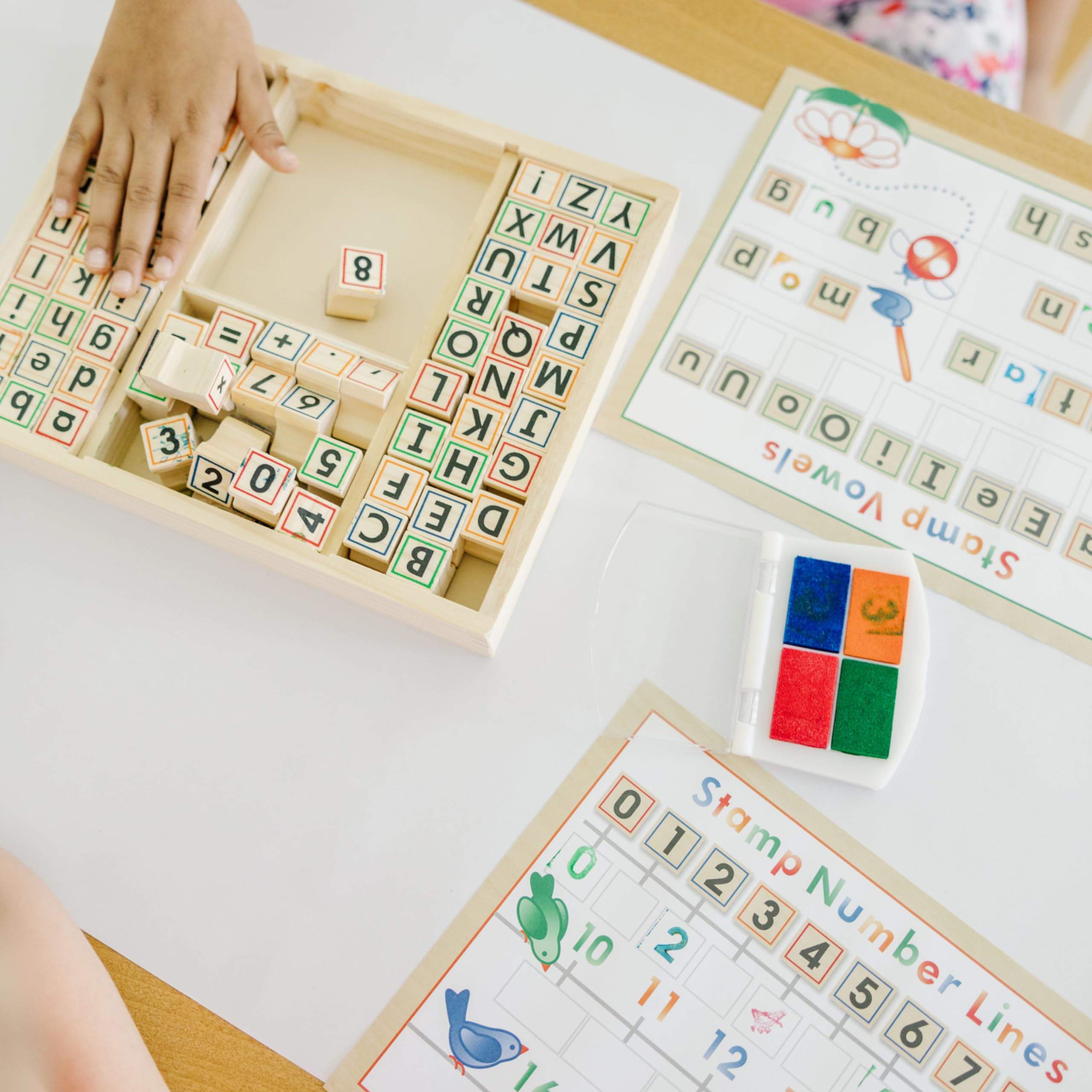 Melissa & Doug Deluxe Letters and Numbers Wooden Stamp Set – 71 Stamps, 4-Color Ink Pad, Activity Book (Ages 4-8)