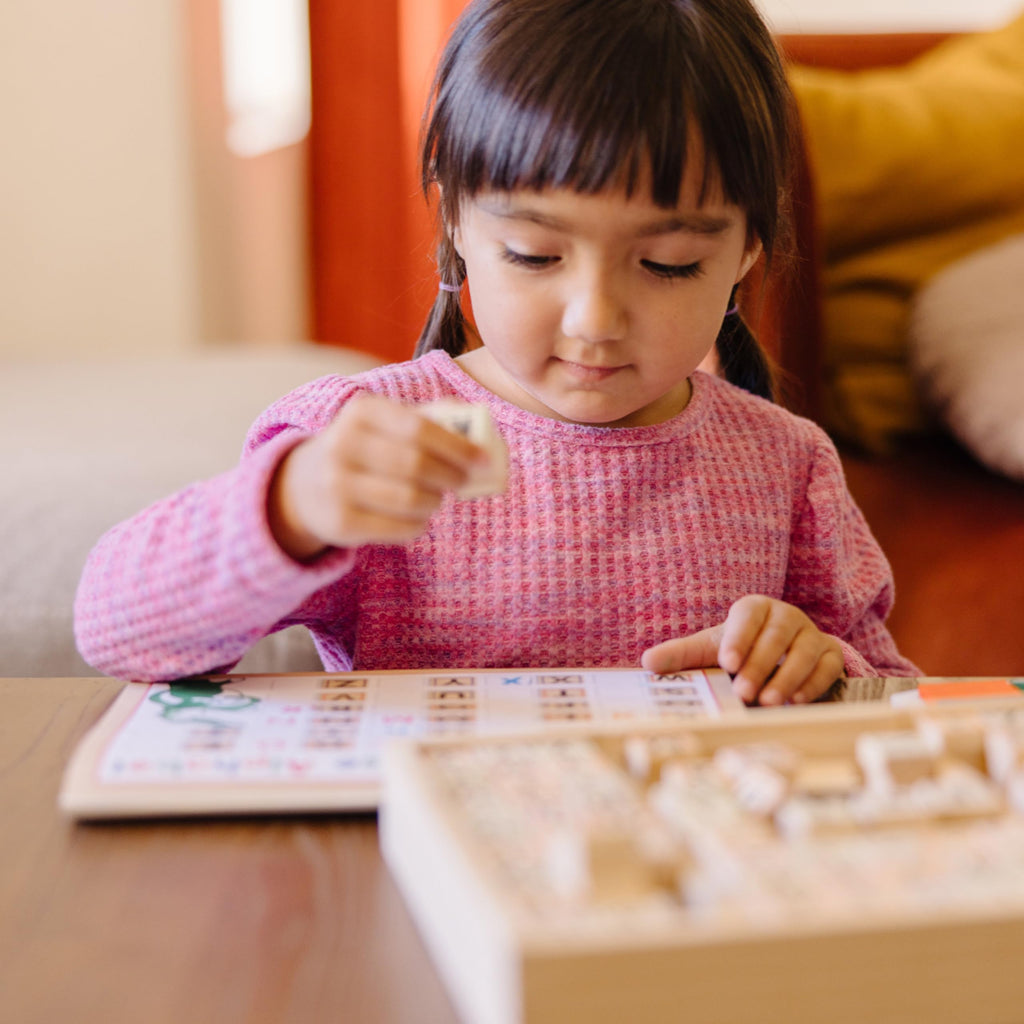 Melissa & Doug Deluxe Letters and Numbers Wooden Stamp Set – 71 Stamps, 4-Color Ink Pad, Activity Book (Ages 4-8)
