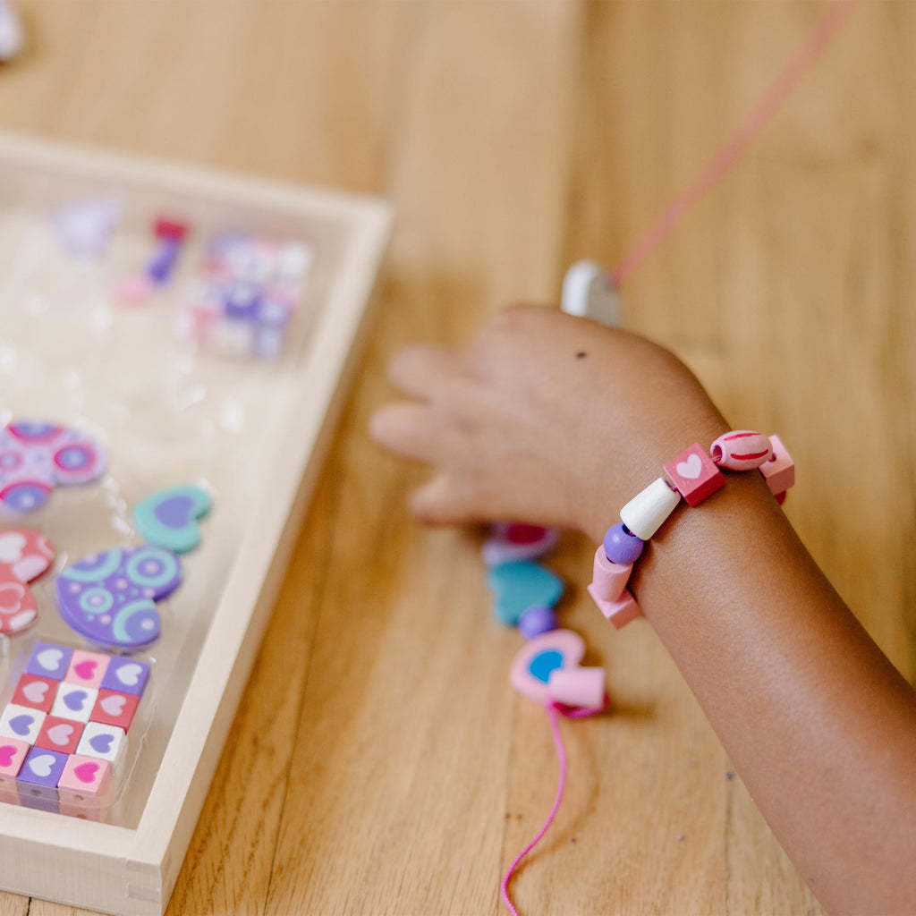 Melissa & Doug Heart Beads Wooden Bead Kit – 120+ Beads & 5 Cords for Kids Jewelry Making
