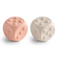 Mushie Silicone Dice Press Toy for Sensory Play – Blush/Shifting Sand, 10+ Months